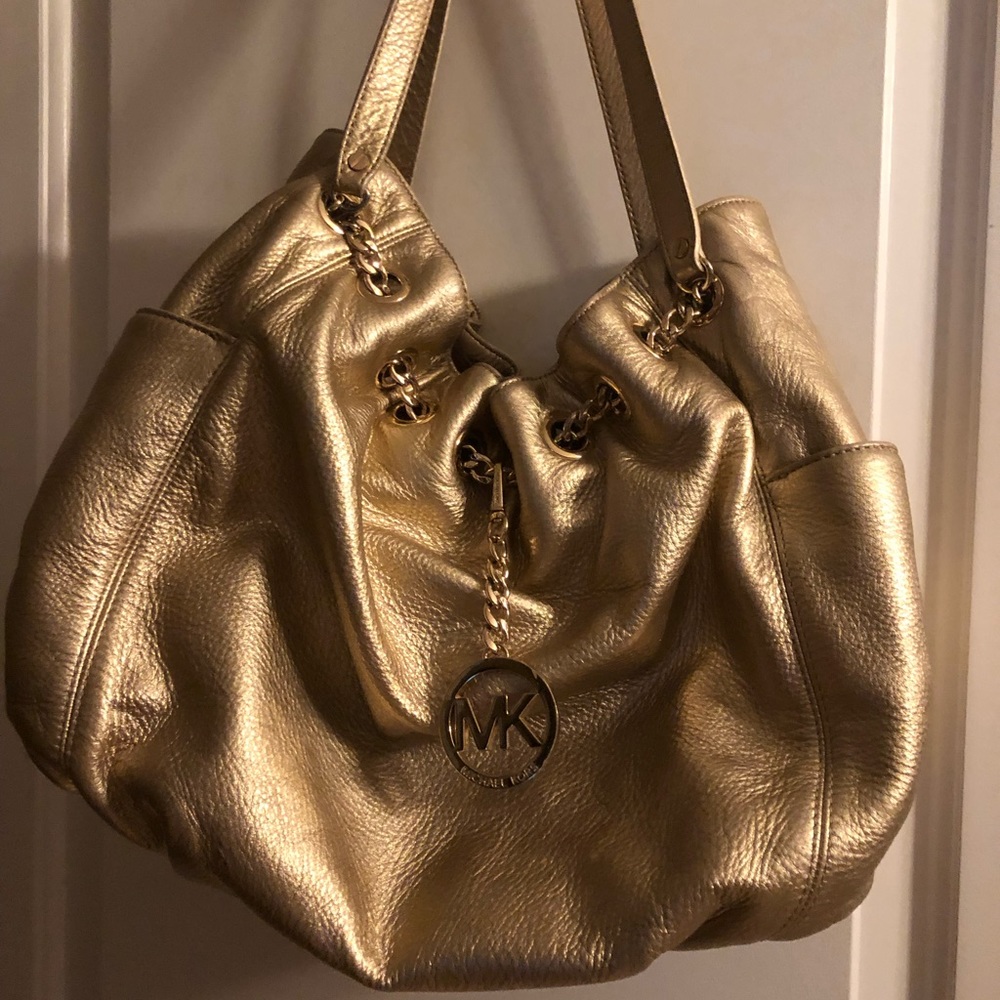 Michael Kors gold hobo bag